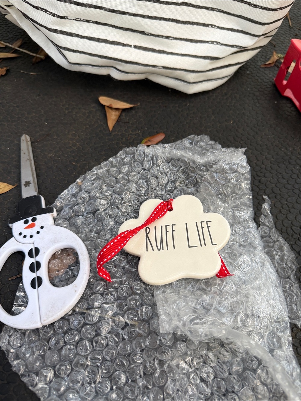 Rae Dunn Cream 'Ruff Life' Dog Paw Ornament with Red Ribbon